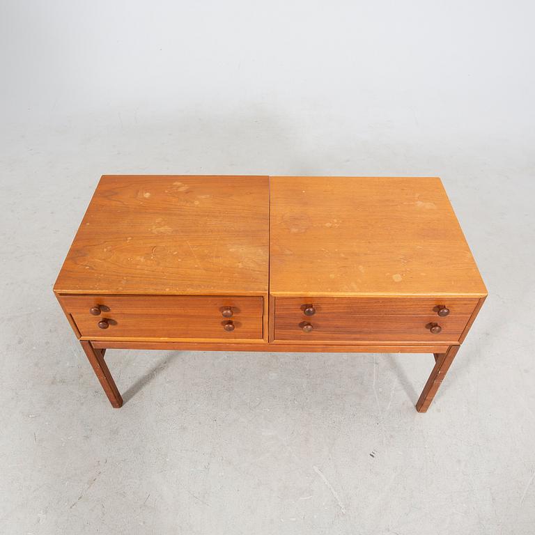 A 1960s teak side table.