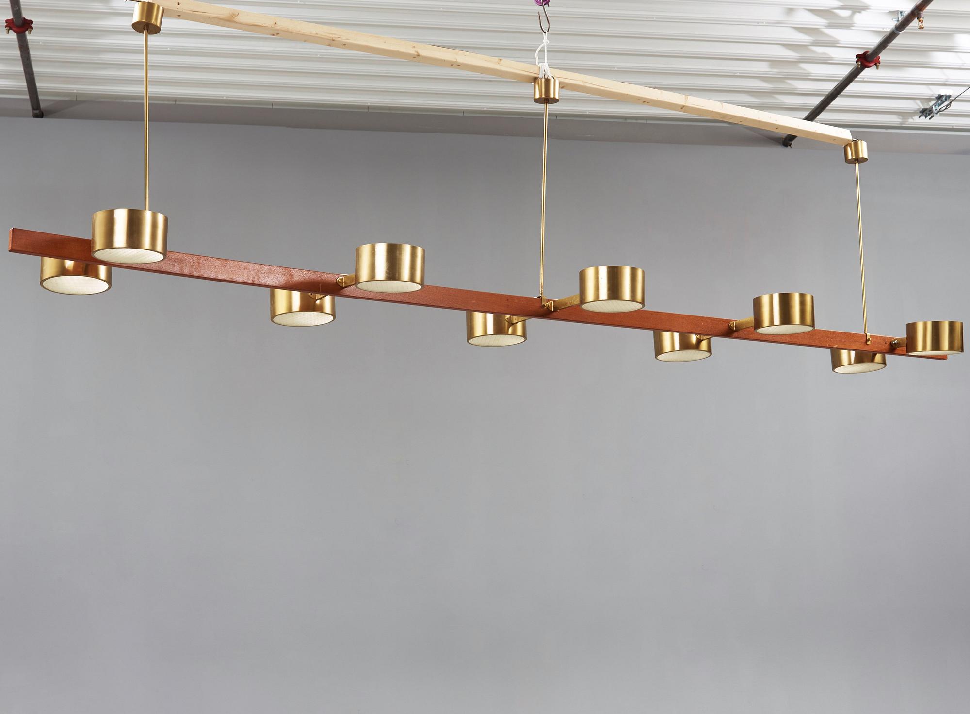 A Hans Agne Jakobsson brass and teak ceiling lamp, Markaryd Sweden 1960-70's.