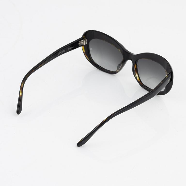 Oliver Goldsmith, a pair of sunglasses.