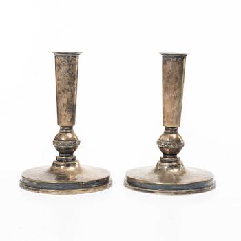 A pair of silver candelabra, MGAB, Uppsala 1951.