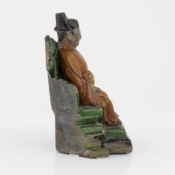 A ceramic sculpture of a seated daoist dignitary, Ming dynasty, (1368-1644).