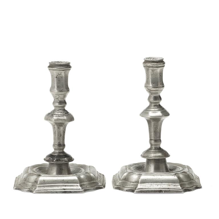 A PAIR OF PEWTER CANDLESTICKS by Anders Hedenbom, Örebro 1734.