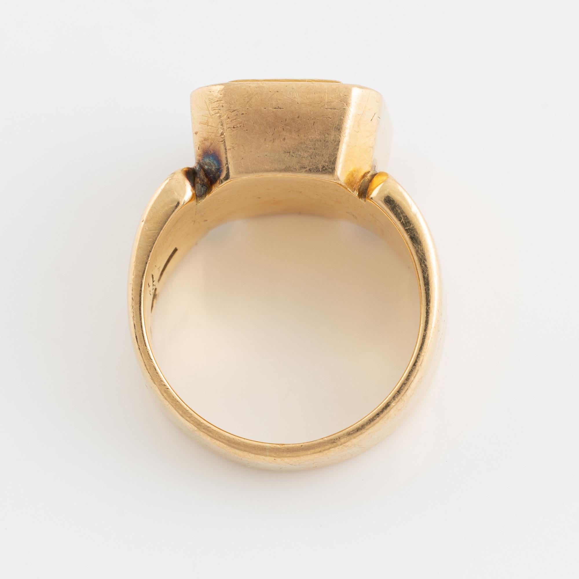 18K gold monograme ring.