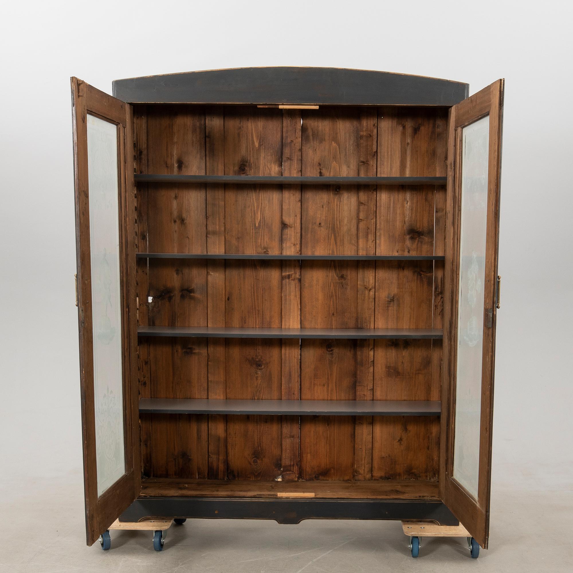 Display cabinet circa 1900.