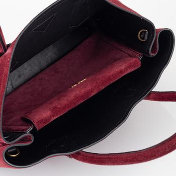 Prada, a suede"Galleria" bag.