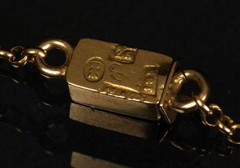 KLOCKA samt KLOCKKEDJA, guld, 14 k samt 18 k.