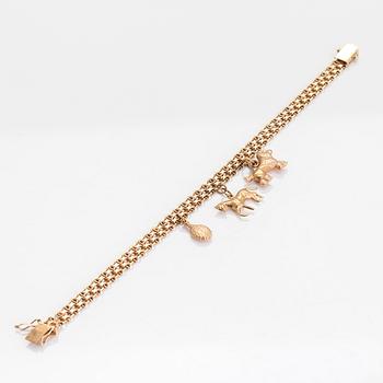 Armband, x-länk, 14K guld med berlocker. Finska importstämplar 1967.