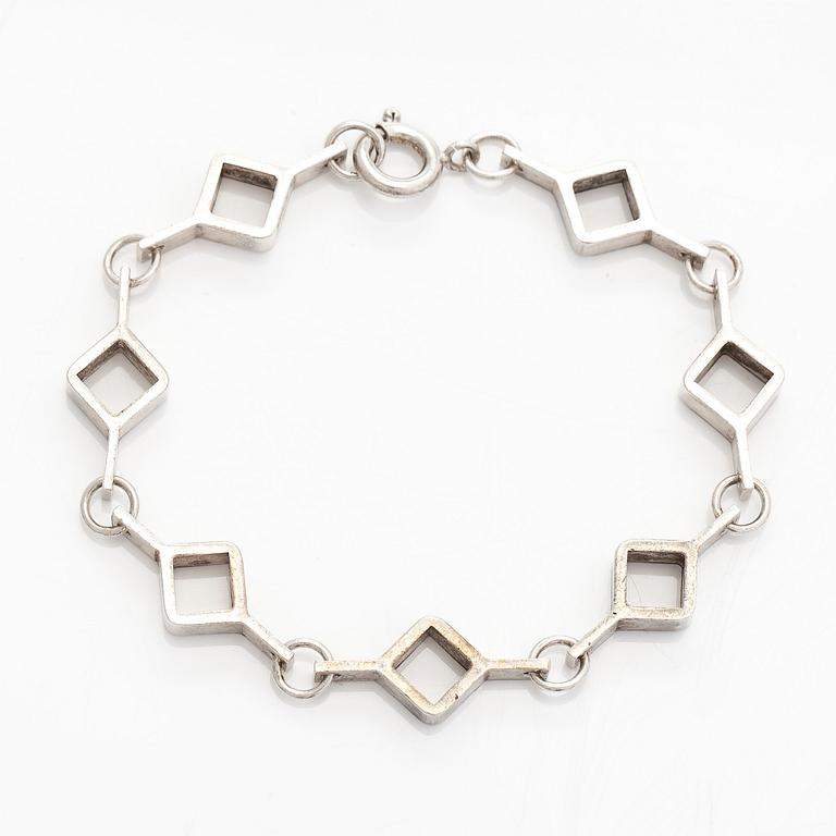 Jorma Laine, a set of two silver pendants, a bracelet and a brooch. Kultateollisuus Oy, Turku 1965-1972.