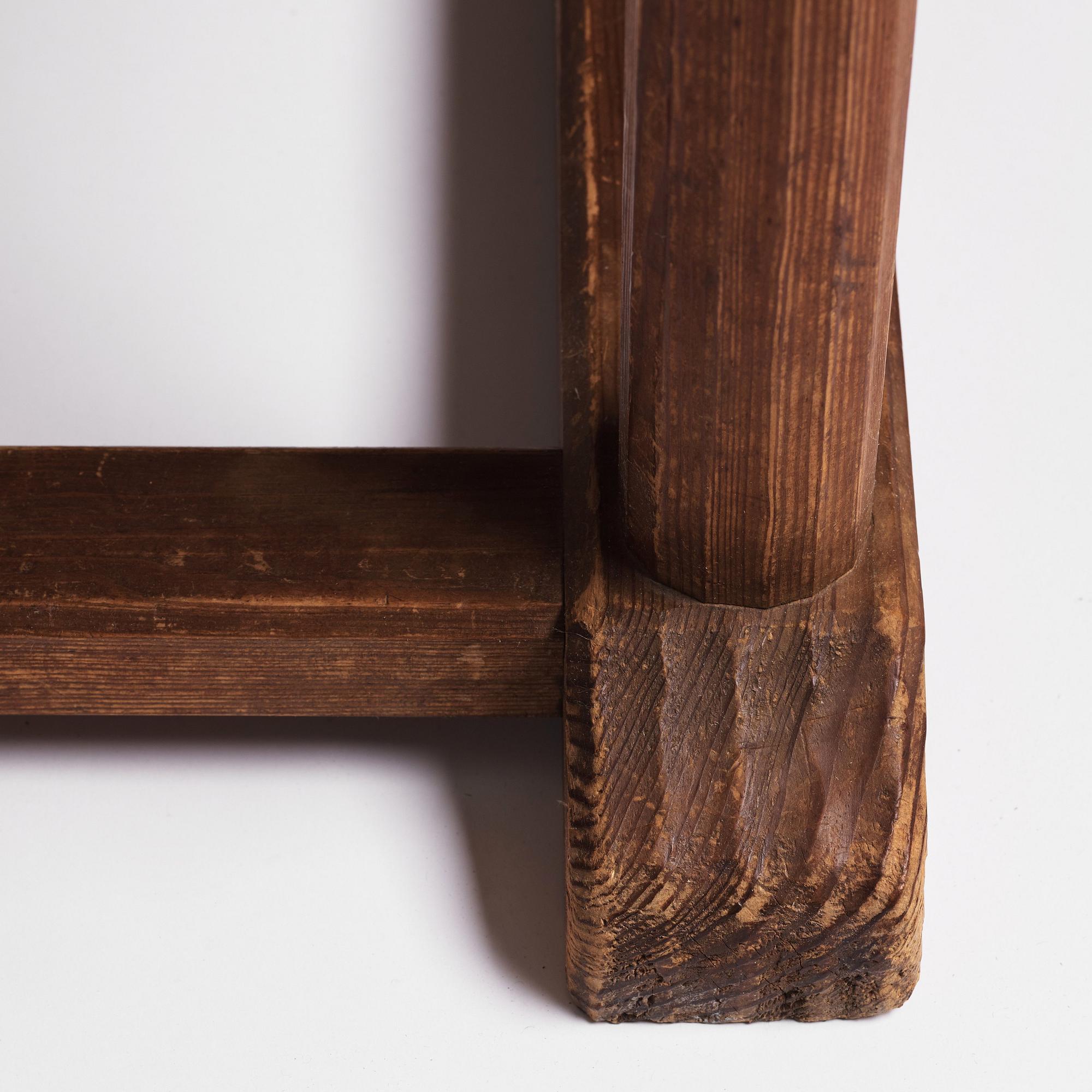 Axel Einar Hjorth, a stained pine and limestone top "Sandhamn" table, Nordiska Kompaniet, Sweden 1931.