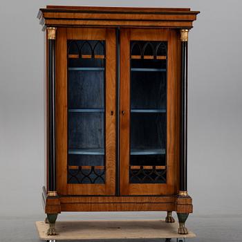 An Empire mahogany cabinet, first half of the 19th Century.