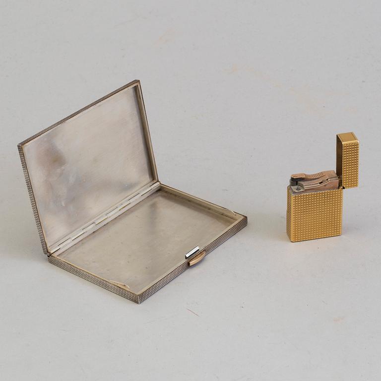 A parcel-gilt silver Dunhill cigarette case and a gold plated Dupont lighter from Paris.