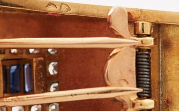 A pair of 1940/50's brooches by Boucheron, set with baguette cut sapphires, brilliant- and single cut diamonds.