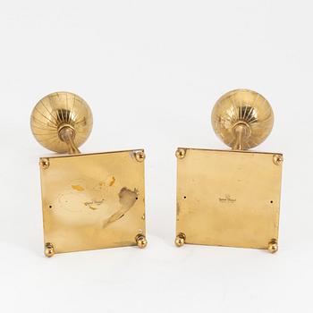 Gunnar Ander, a pair of brass candlesticks, Ystad metall, mid 20th Century.