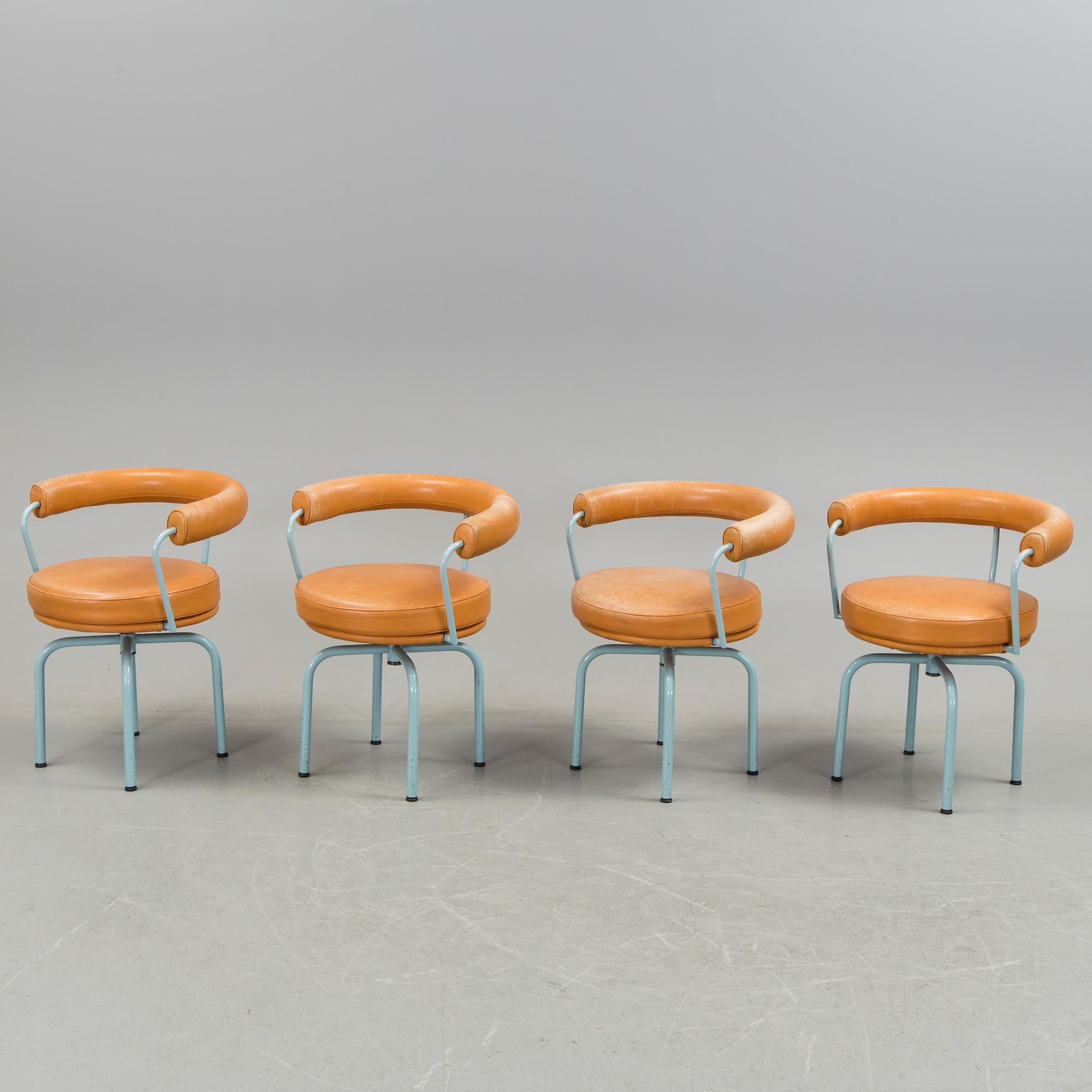 A set of four "LC7" chairs by Le Corbusier, Pierre Jeanneret and Charlotte Perriand for Cassina.
