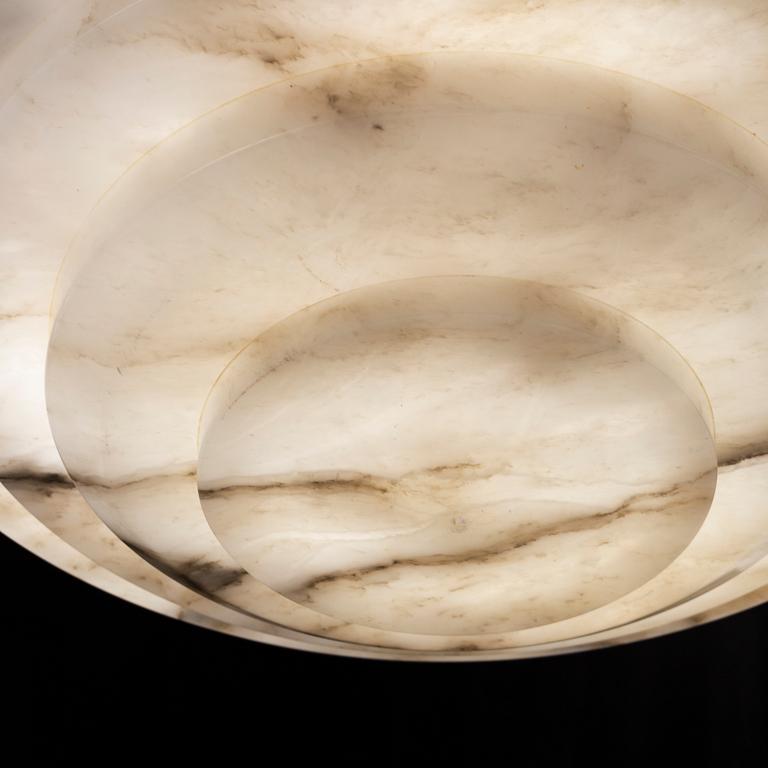 A 1920's alabaster ceiling light.