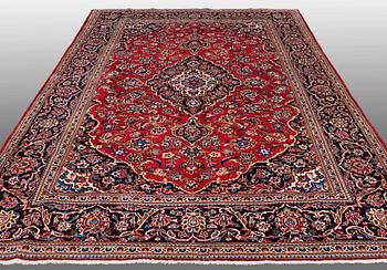 A CARPET, Kashan , signed, ca 300 x 202 cm.