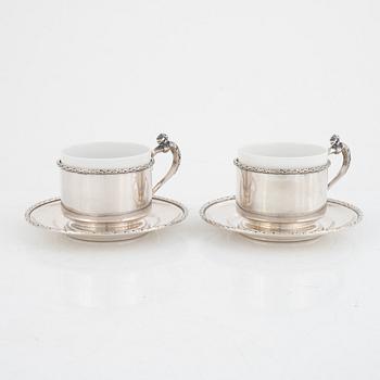 Silver tea mug holders with saucers, Pest, Austria, around 1900.