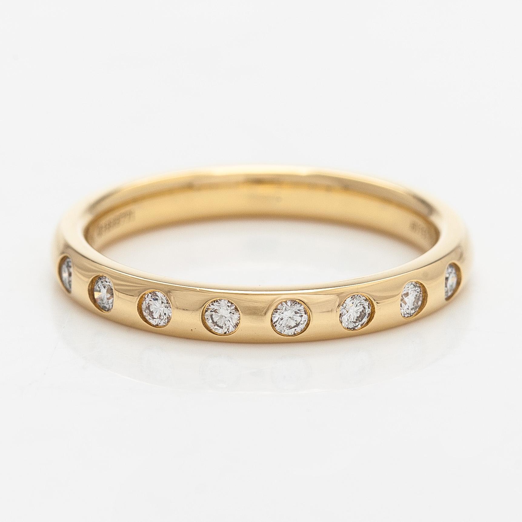 Tiffany & Co, !8 K gold stacking band ring, brilliant-cut diamonds, Peretti.