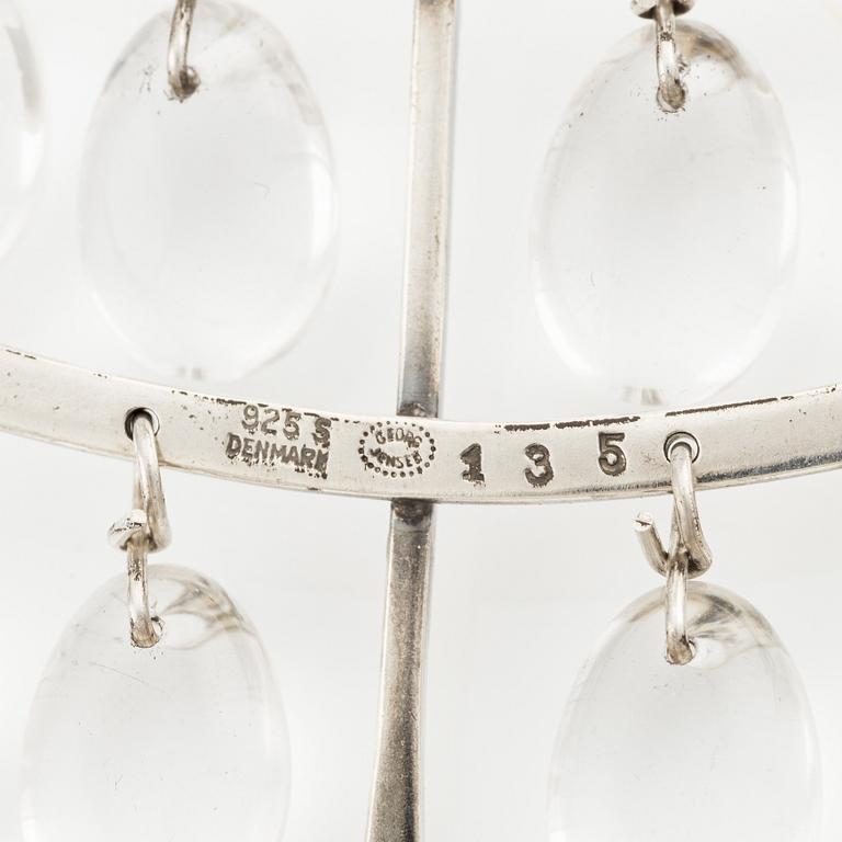 Vivianna Torun Bülow-Hübe, a necklace with a pendant, No. 169 and No. 135, sterling silver with rock crystal, for Georg Jensen, Copenhagen.