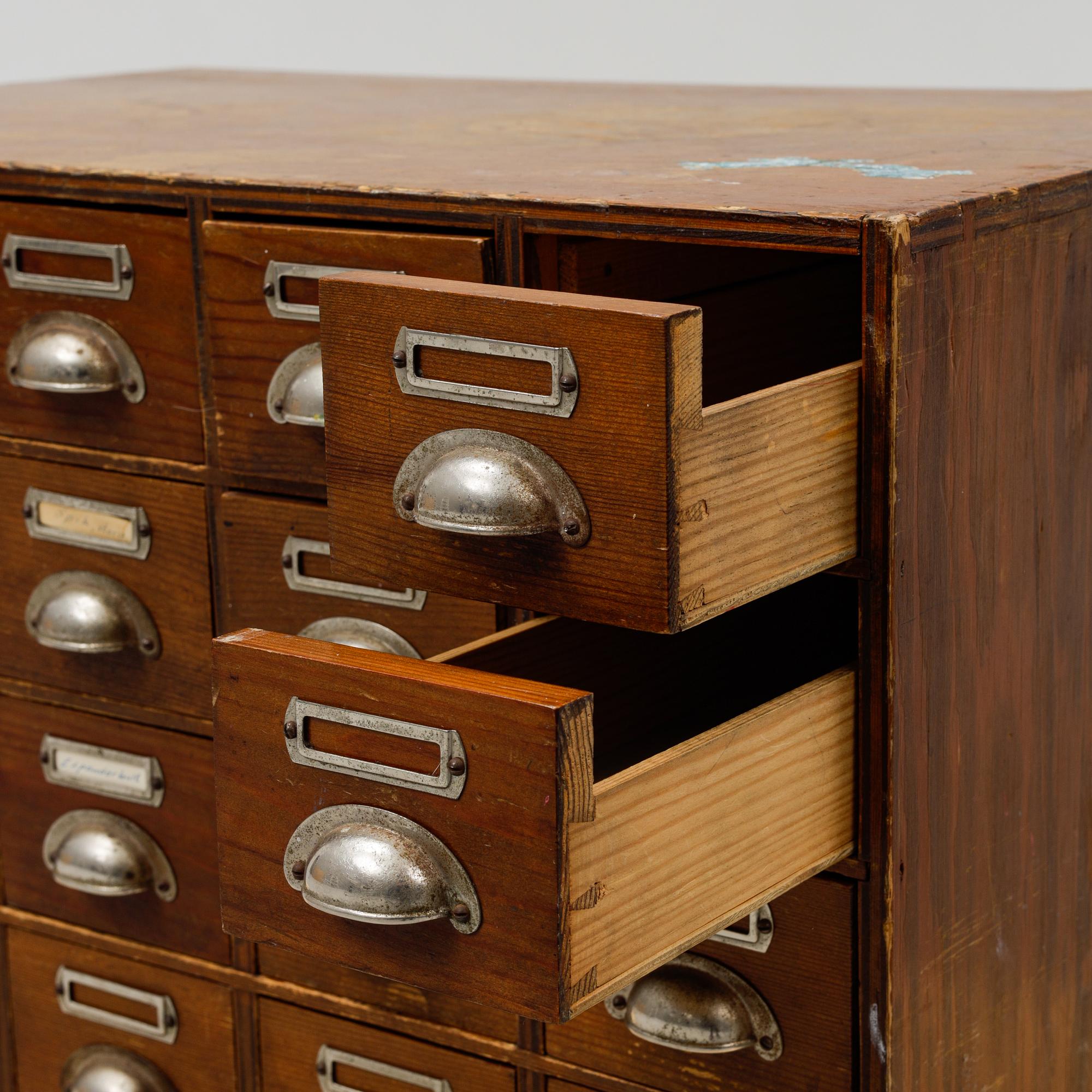 A pine cabinet with drawers, first half of the 20th Century.