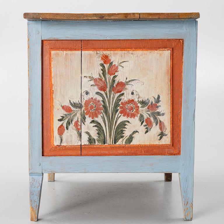 A Swedish folk art polychrome-painted table from Järvsö, Hälsingland, dated 1834.