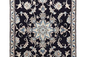 A rug, Nain, part silk, c. 147 x 89 cm.