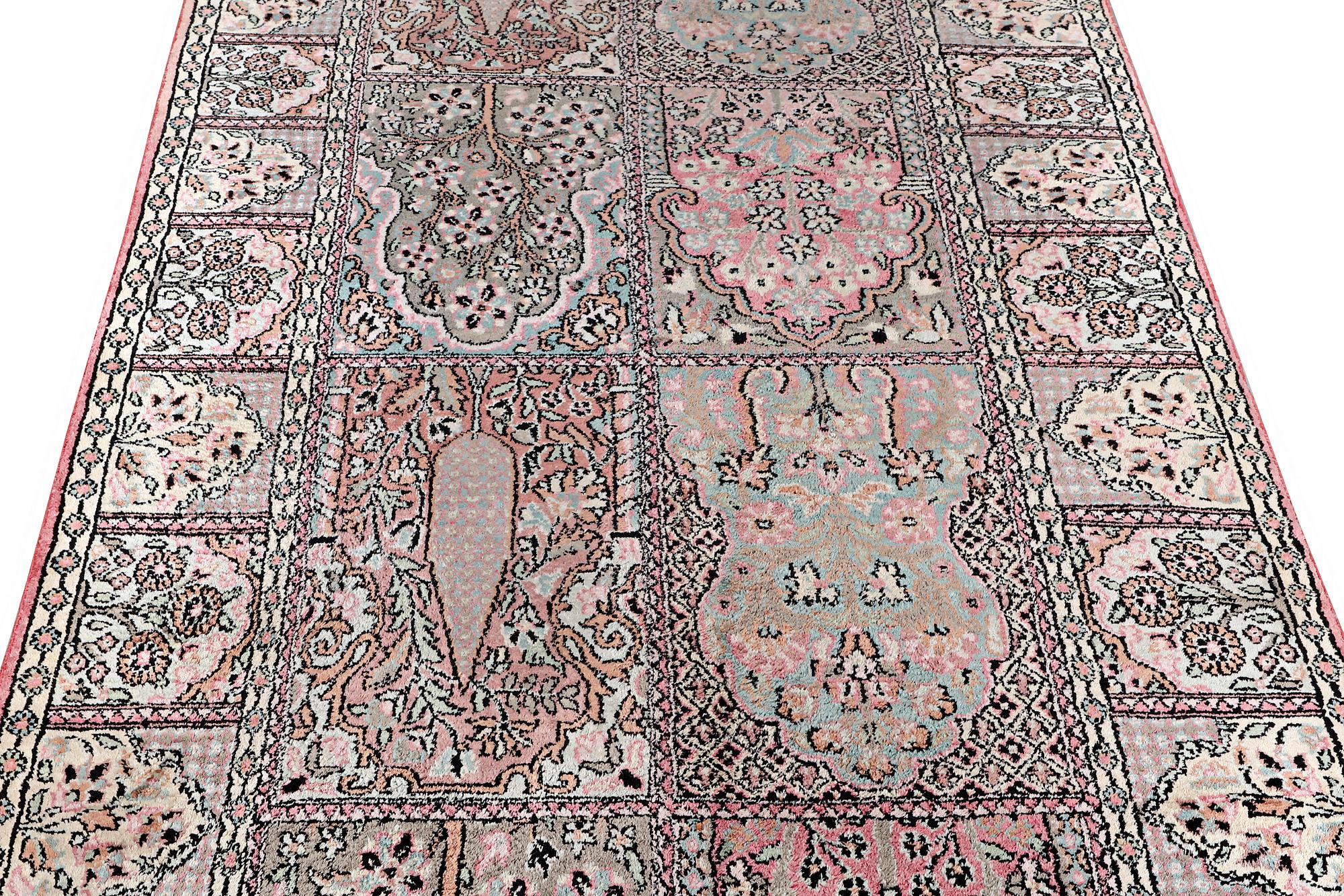 A Kashmir runner carpet, silk, c. 364 x 97 cm.