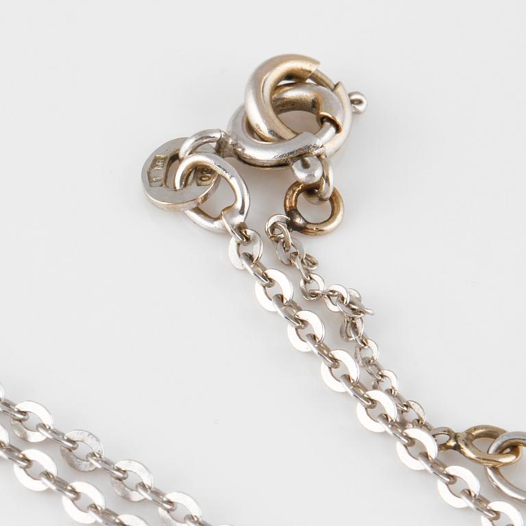 HÄNGE, 18K vitguld med briljantsliapd diamant ca 0.25 ct. Vikt 4,7 gram.