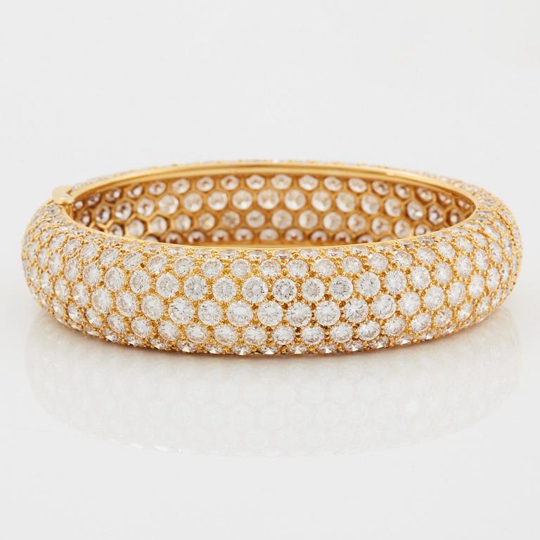 Cartier armring 18K guld med runda briljantslipade diamanter.