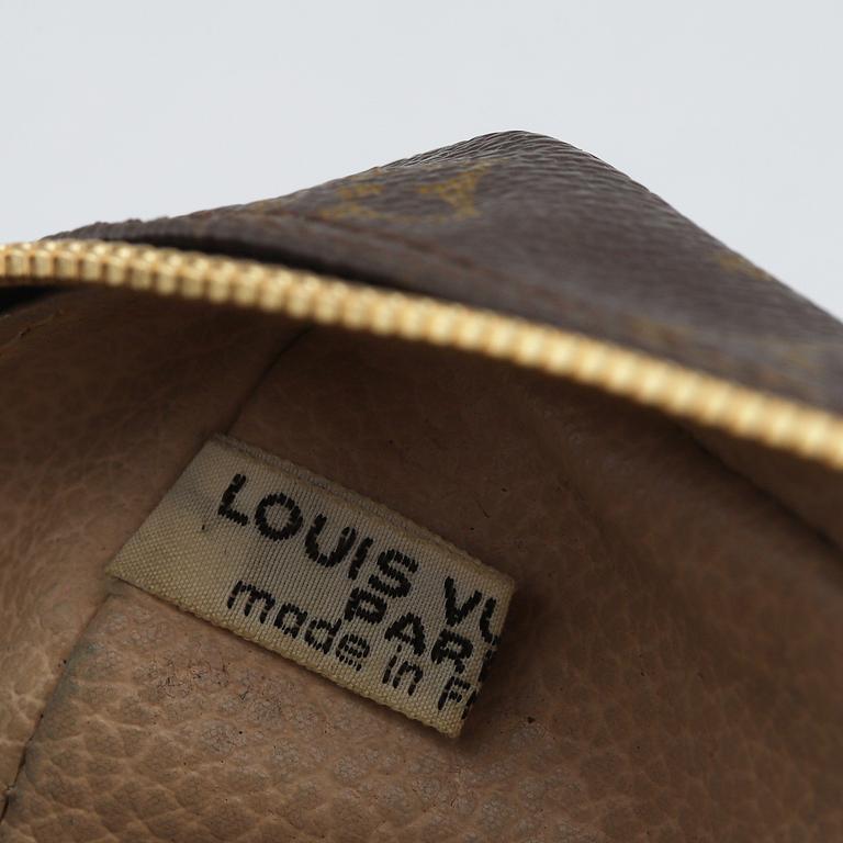 LOUIS VUITTON, a 'Trousse toilette 28' toilet bag and a key case.