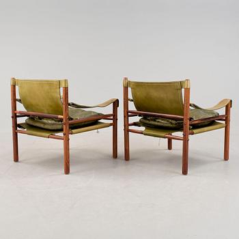 KARMSTOLAR, ett par, "Sirocco", Arne Norell, formgiven 1964.