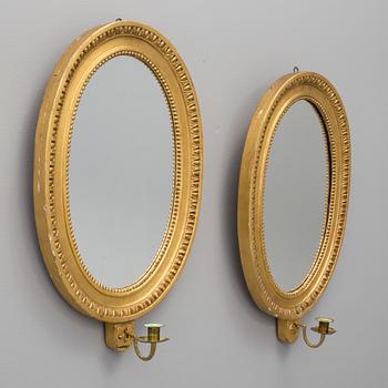 A pair of  one-light girandole mirrors, late 19th century.