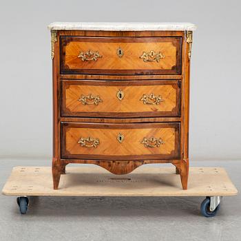 A Louis XV style chest of drawers, probably France, second half of the 19th century.