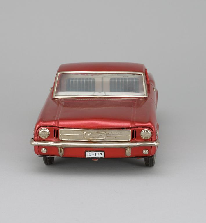 A Japanese Nomura Toys Ford Mustang, 1960s.