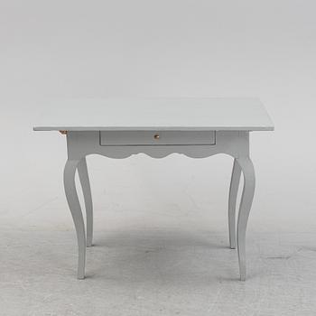 A painted rococo table, 18th Century.