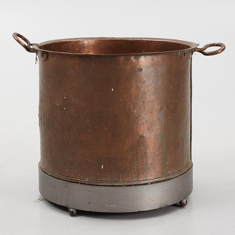 A copper barrel, 19th Century.