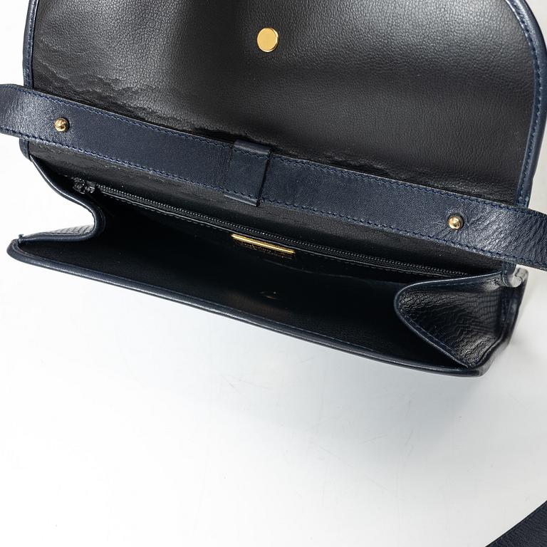 Christian Dior, a handbag.