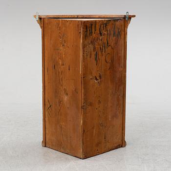 A Swedish painted wall cupboard, dated 1803.