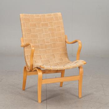 KARMSTOL. "Eva" design Bruno Mathsson för Karl Mathsson. Daterad 1977.