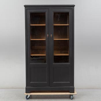 An early 20th century painted display cabinet.