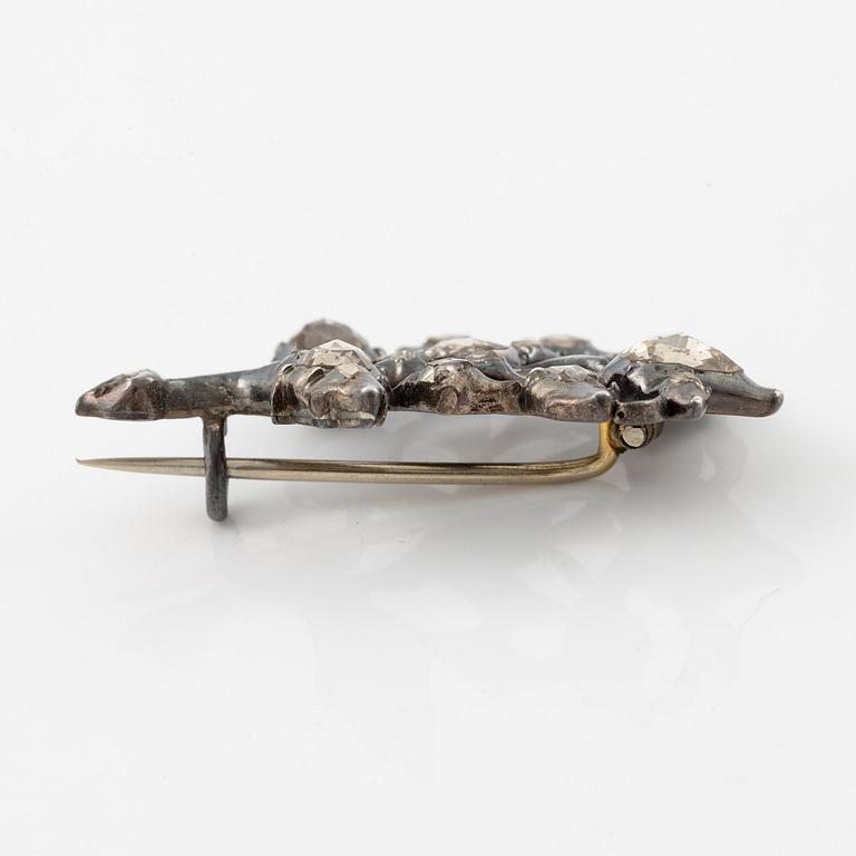 Brooch in silver set with rose-cut diamonds, 19th century.