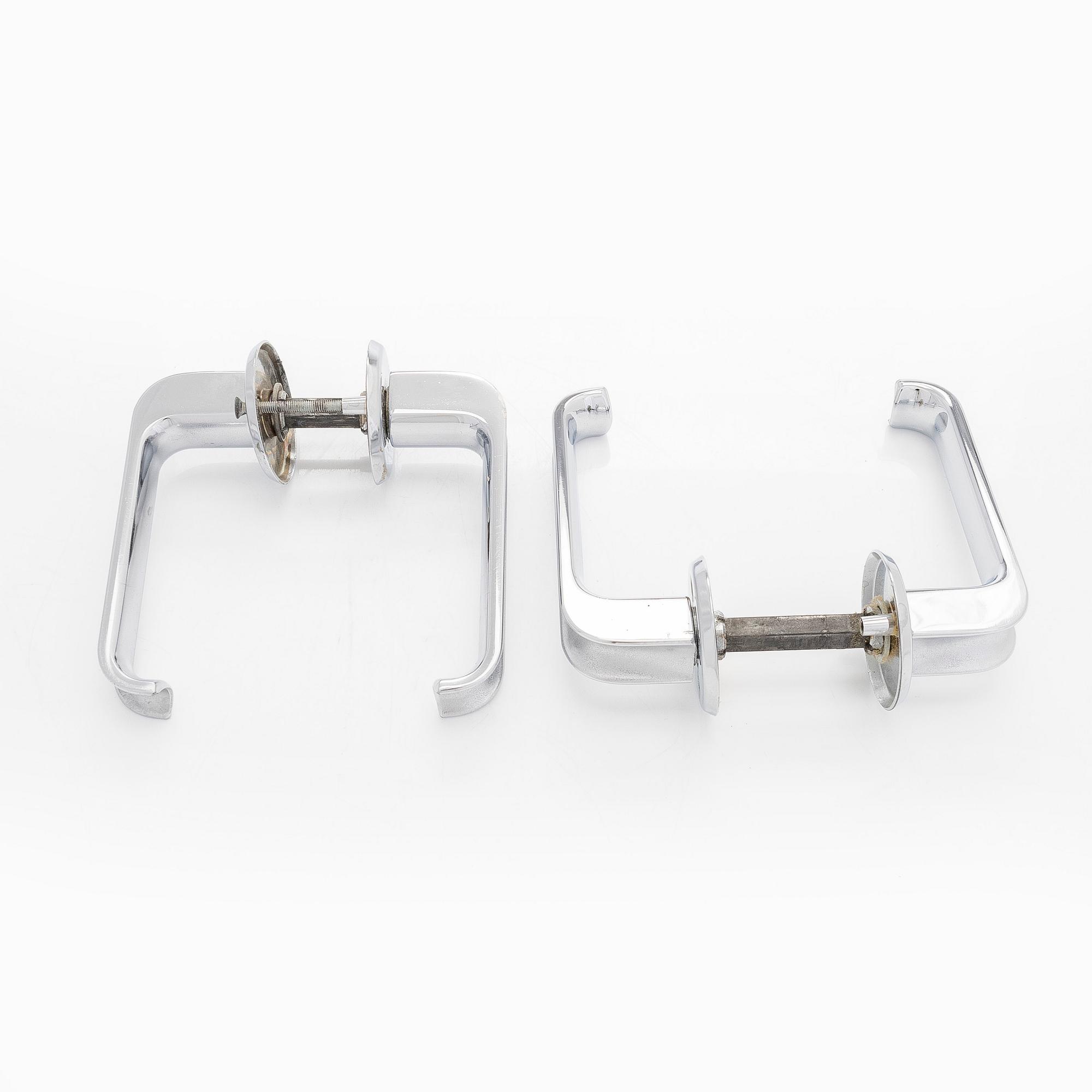 A set of six 1960s-1970s door handles.