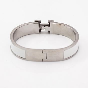 Hermès, armband, "Clic H PM", silverfärgad metall och vit emalj.