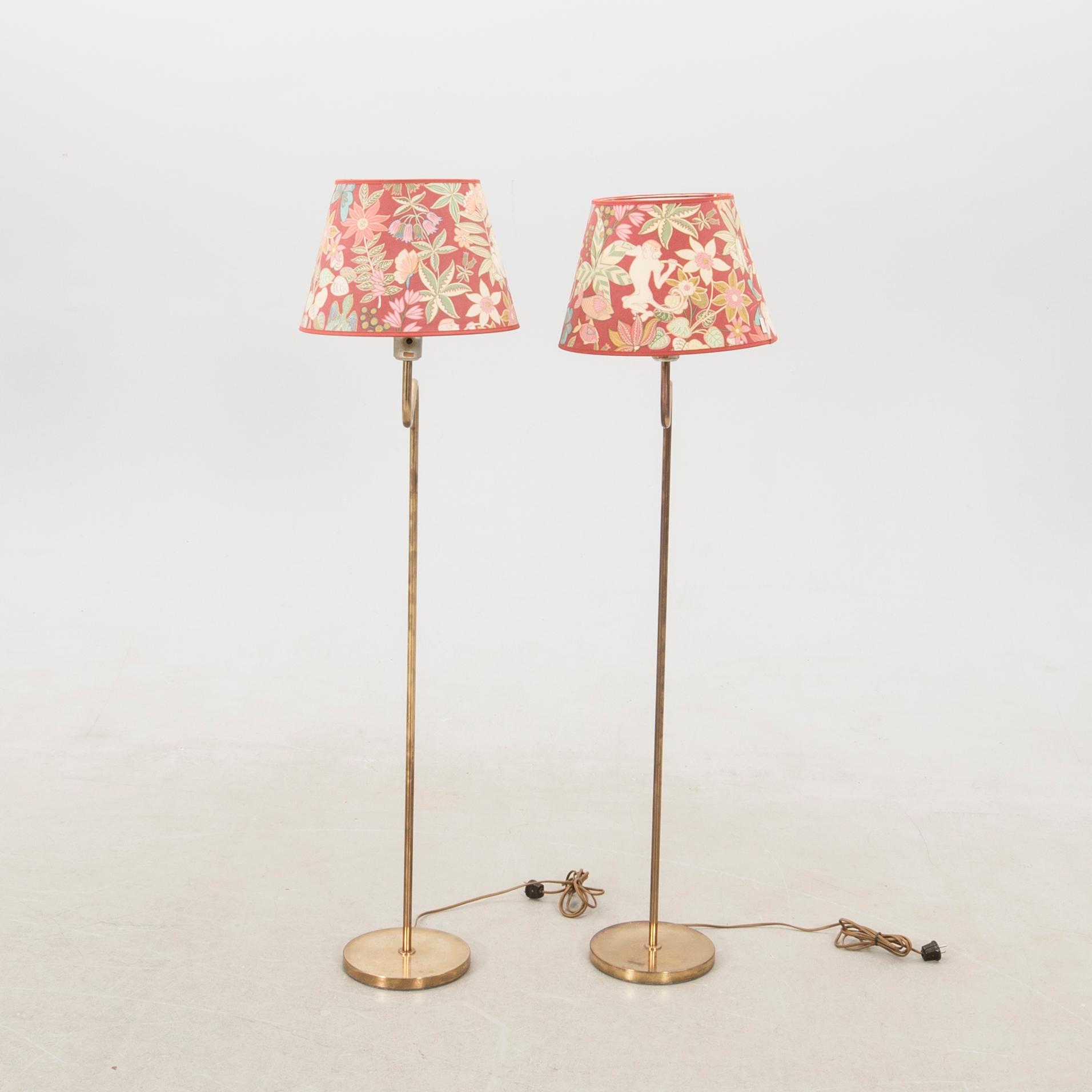 Floor lamps, a pair probably Aneta, late 1900s.