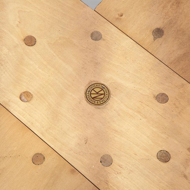 Axel Einar Hjorth, A root veneered dining table, Nordiska Kompaniet, 1938.