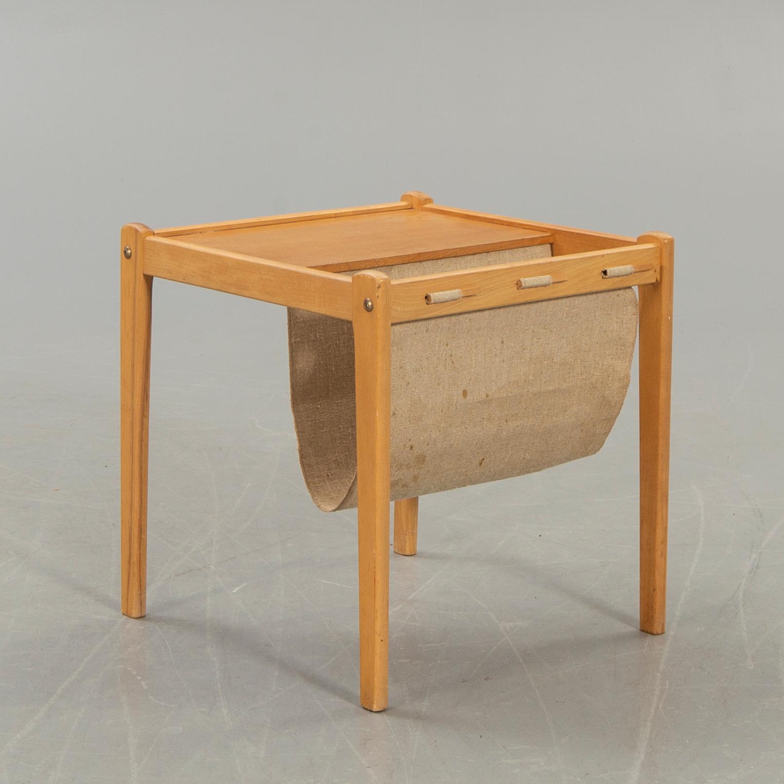 A Danish 1960s side table SP Jensen Furbo.