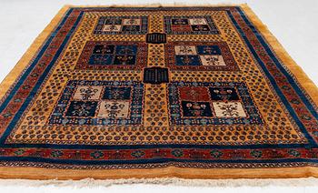 An oriental 'garden' carpet of Safavid design probably from the Shiraz area, Iran, c 343 x 254 cm.
