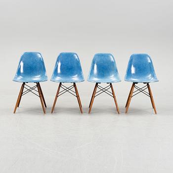 A set of four Charles and Ray Eames 'Plastic Chair DSW' with later stands, designed 1950.