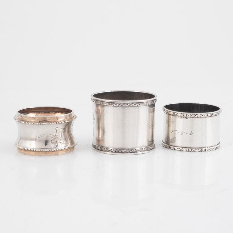 A set of five silver napkin rings, including Russia, circa 1900.