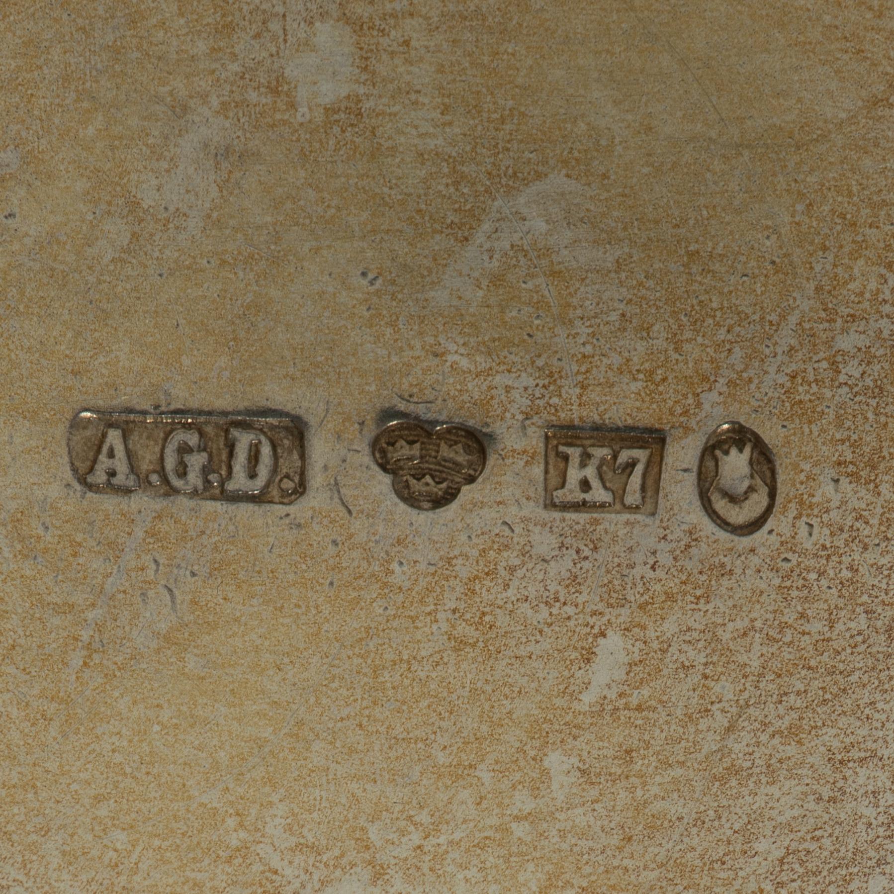 A Swedish silver coffee pot, cream jug and sugar box, Gustavian style, mark of AG Dufva, Stockholm 1911-1912.